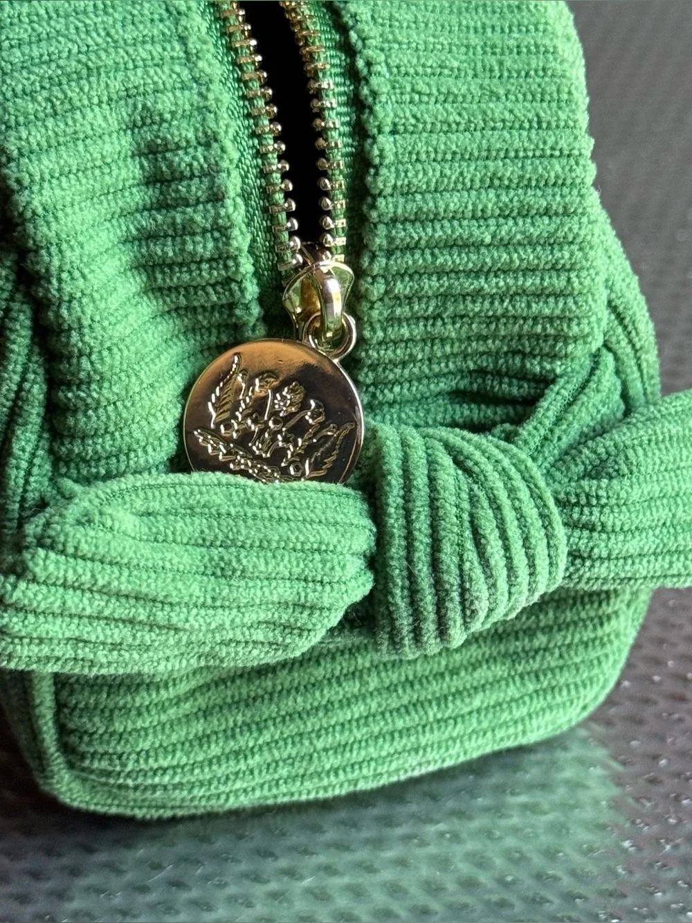 Tata Harper small green corduroy makeup bag